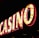 Brightly illuminated letters spell out 'CASINO' with glowing yellow bulbs and red outlines against a dark background.
